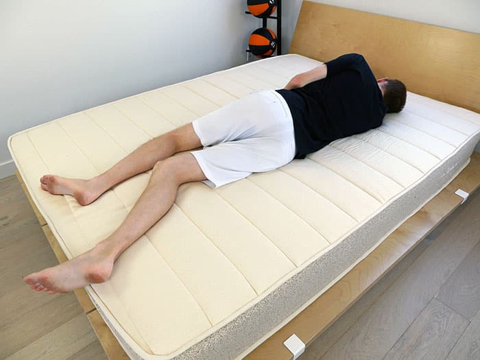 Lying on a latex mattress (Birch)