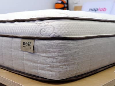 Allswell Cool logo Nest Bedding Owl corner