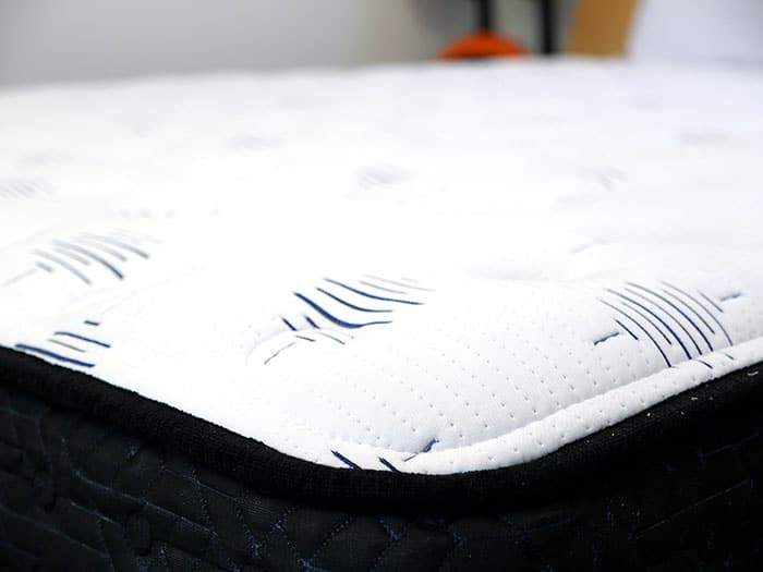 Ashley Furniture Ultra Luxury Firm Tight Top cover close-up