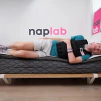 Puffy Lux Hybrid Edge Support Test Side Sleeping With Vest